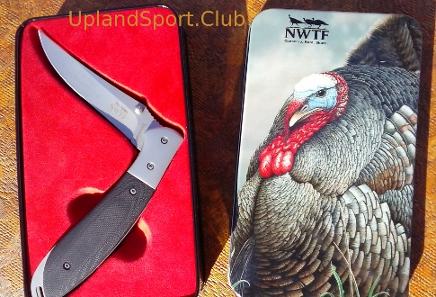 Browning folding knife engraved with NWTF emplem and 1st Place UplandSport.Club Trap